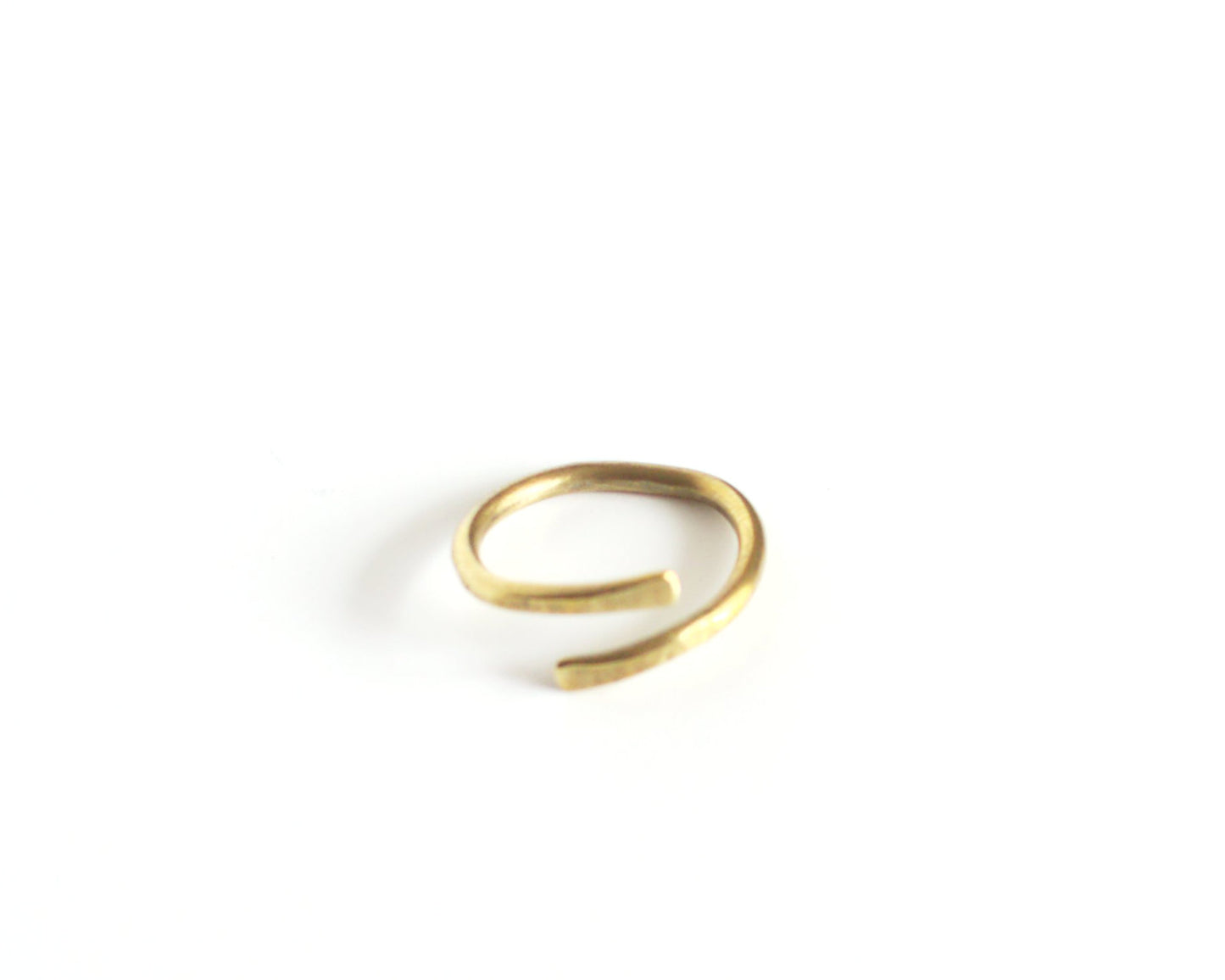 Brass open ring on a white background