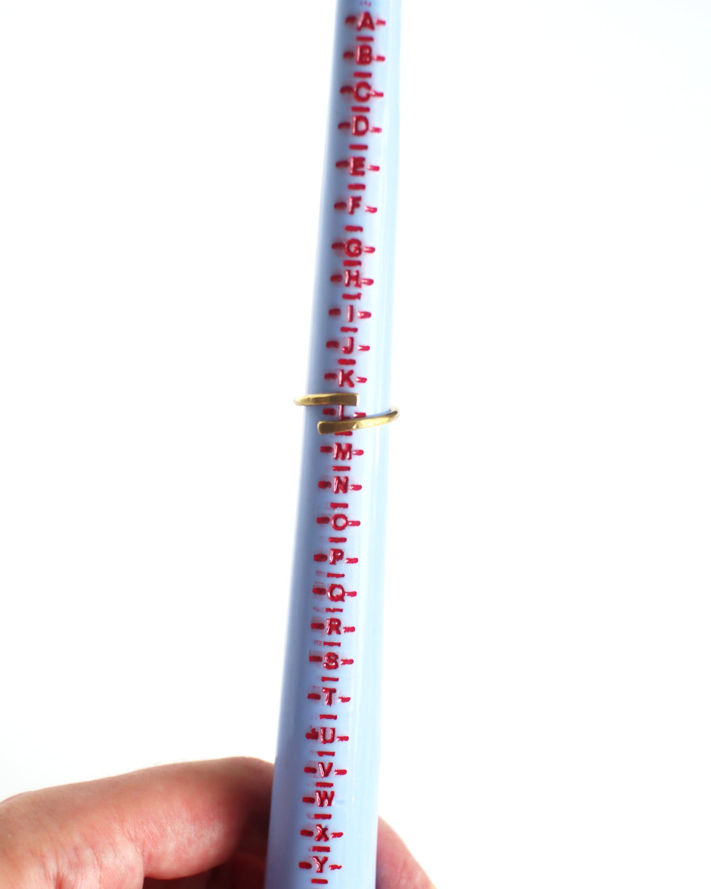 Brass ring shown on UK ring sizer at exacly size L - or US size 5.5