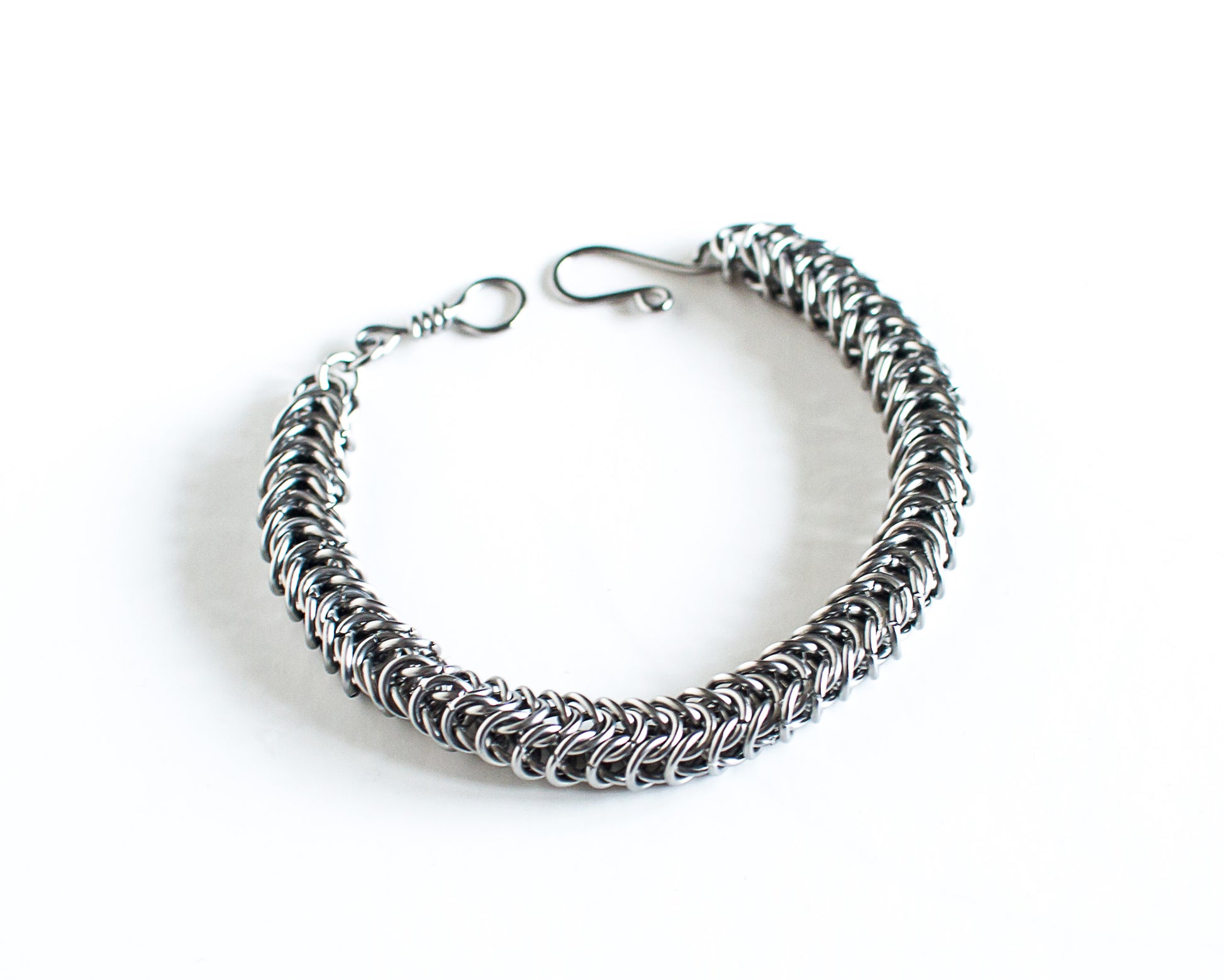 Steel chain bracelet on a white background